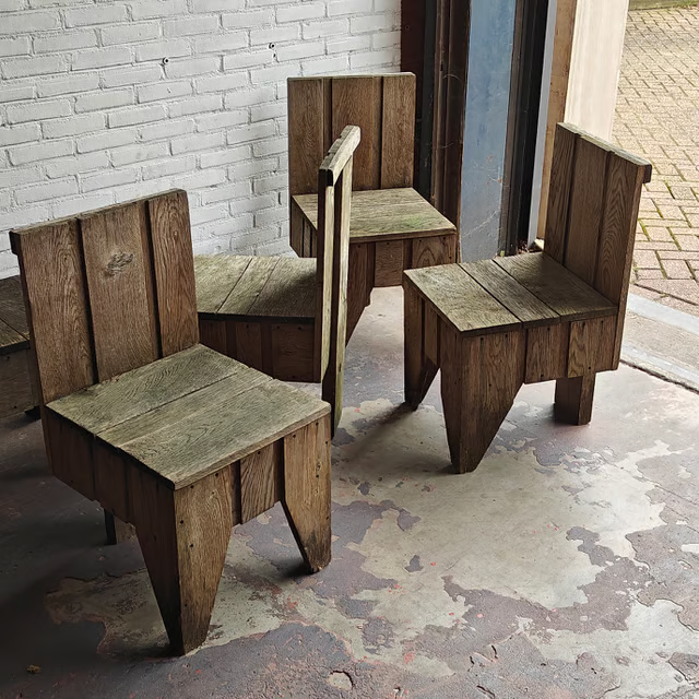 Sculptural 1980's carpenter made garden chairs 2.png