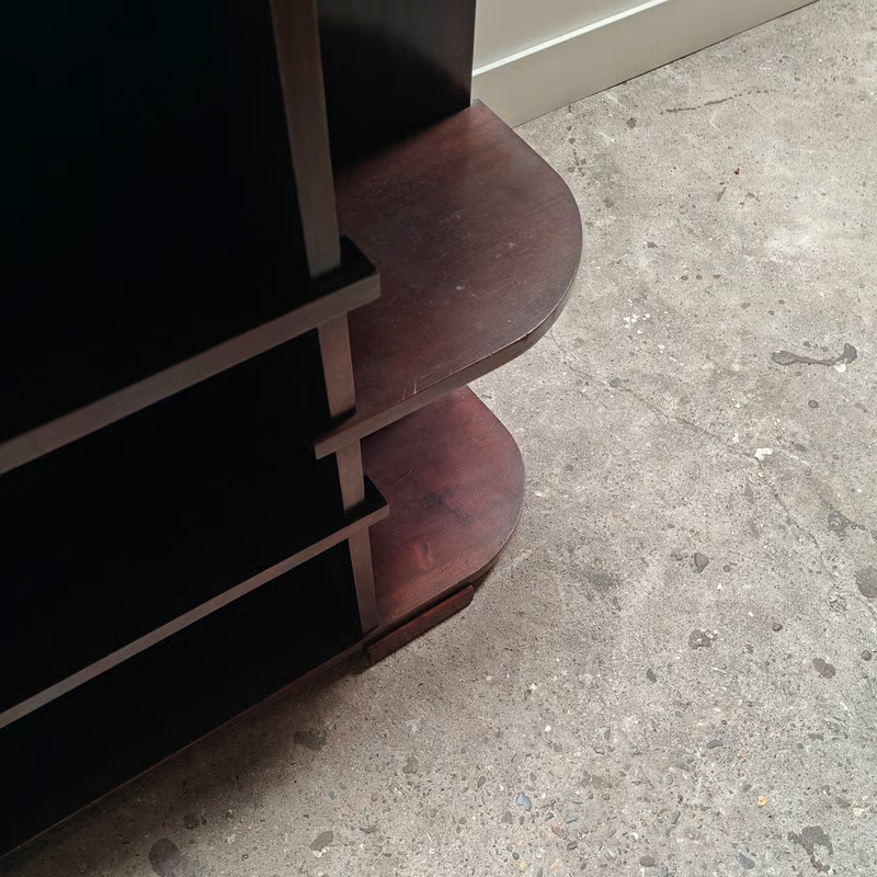 Dark asymmetrical modernist shelving unit 2.png