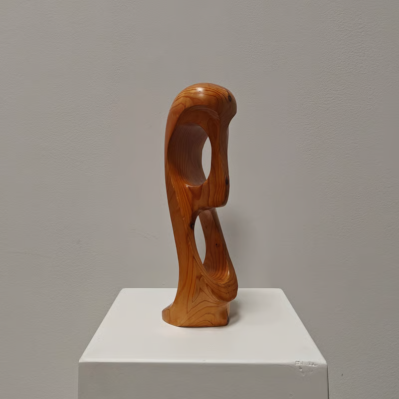 Blond wooden sculpture 2.png