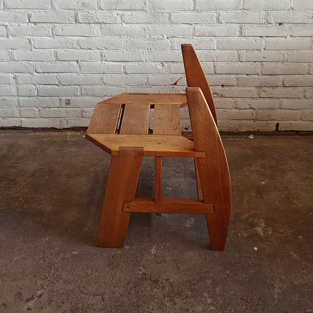 Versatile and sculptural oak stool 8.png