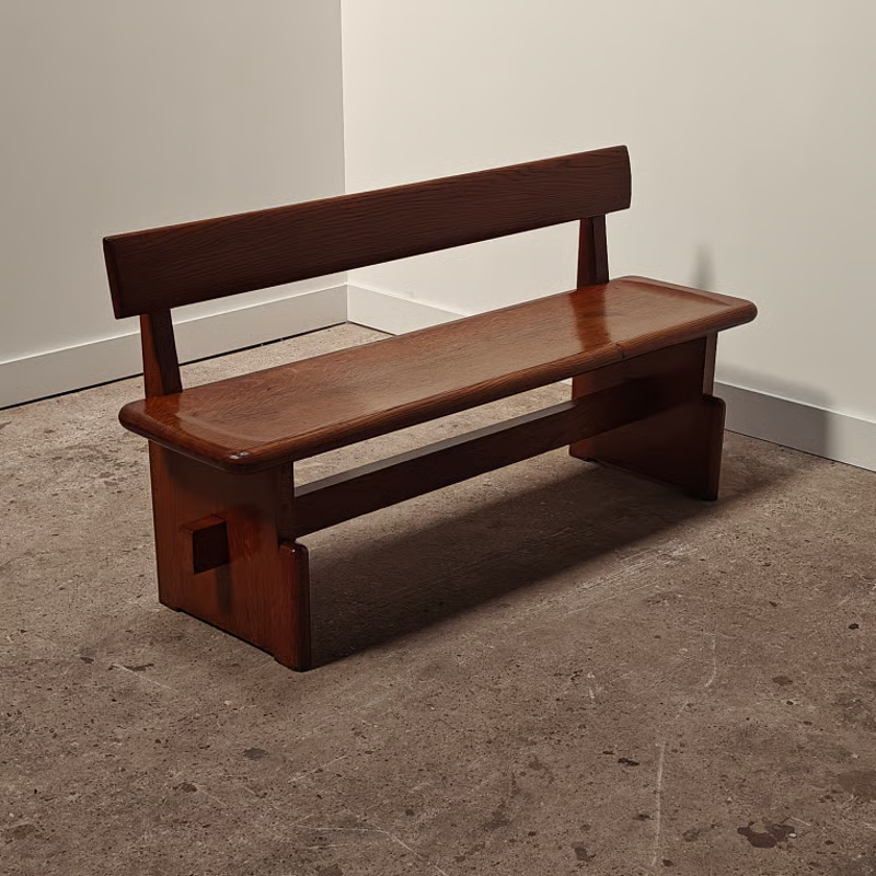 Antique oak bench in a subtle Amsterdam school style 1.png