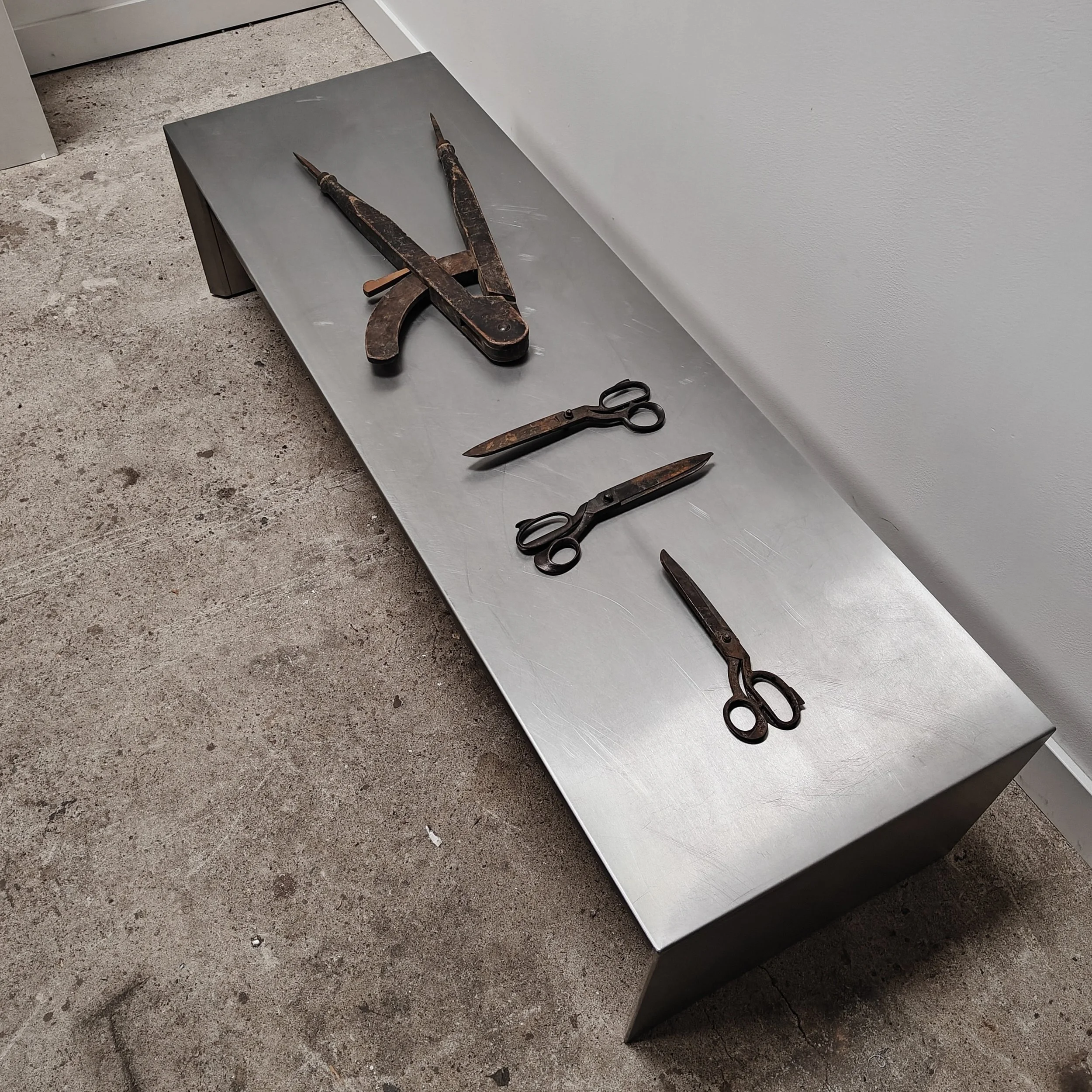 1990s stainless steel design console with black drawers 11.jpg