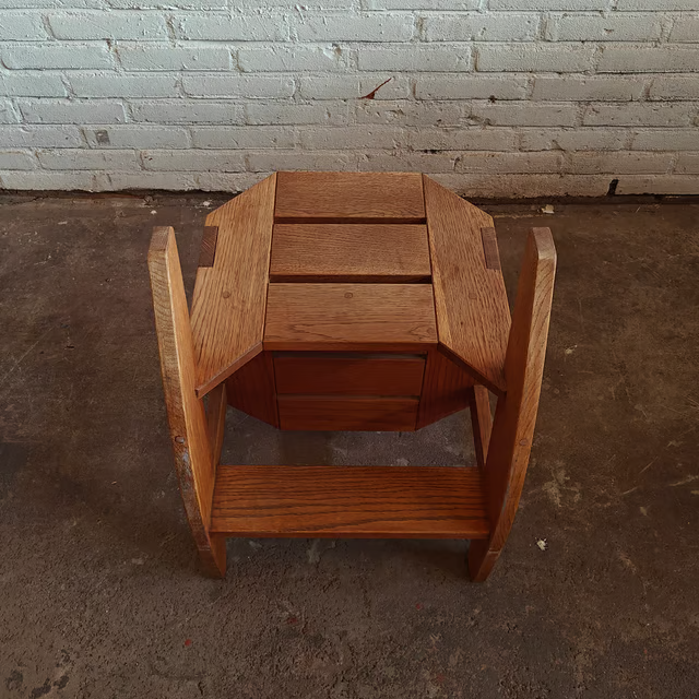 Versatile and sculptural oak stool 3.png