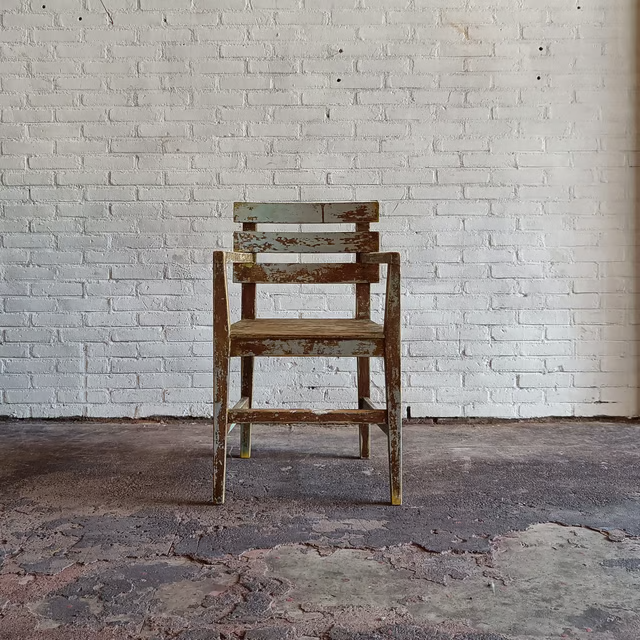 French patinated armchair