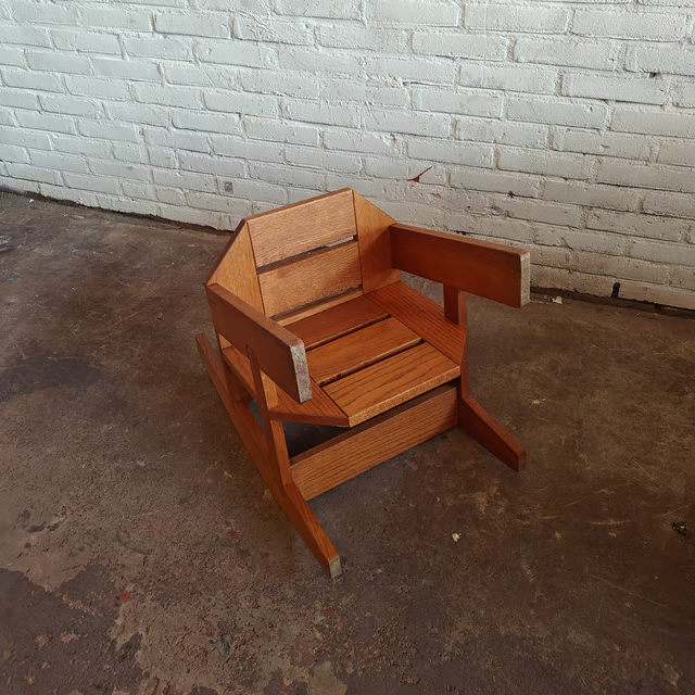 Versatile and sculptural oak stool 9.png