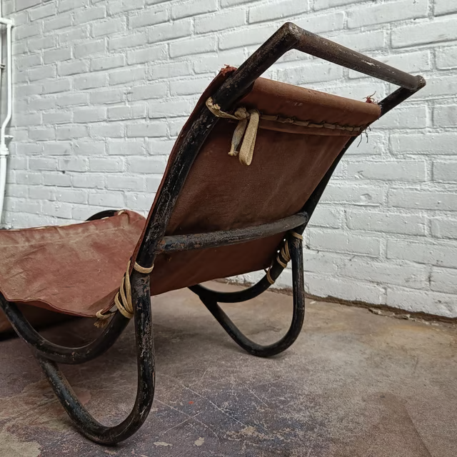 Low tubular and canvas lounge chair 8.png