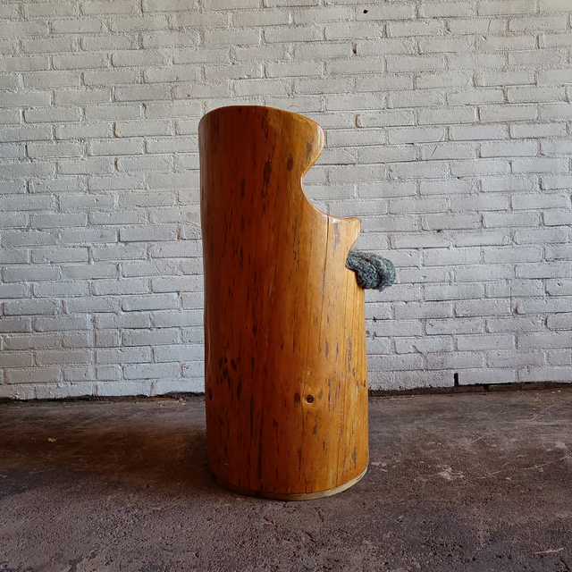 Tree trunk kubb chair with upholstered seat 1.png