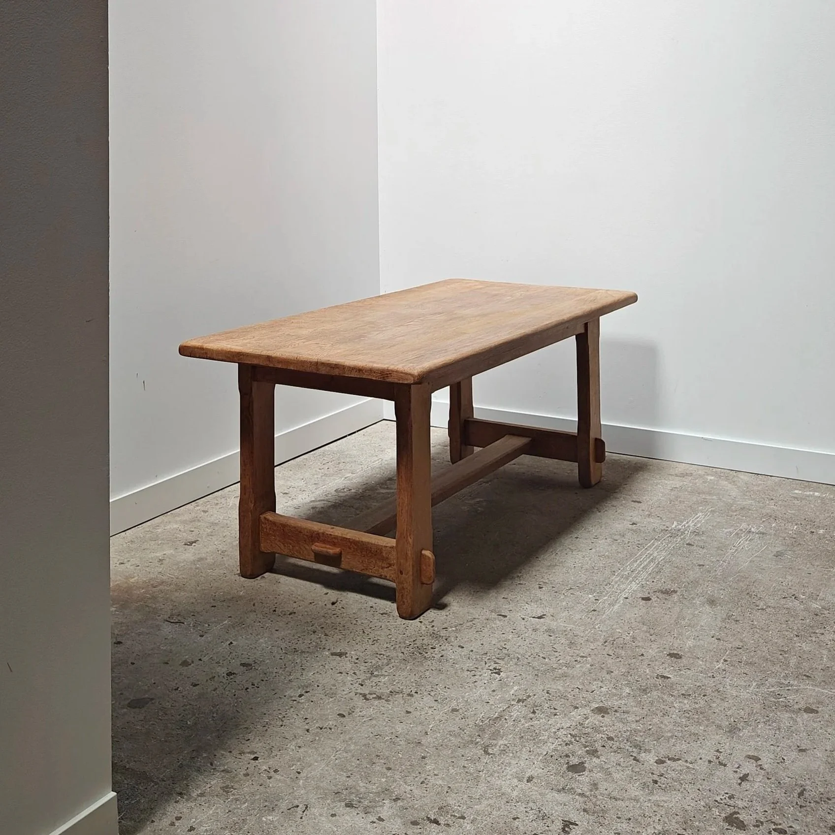 Oak dining table with a visible construction