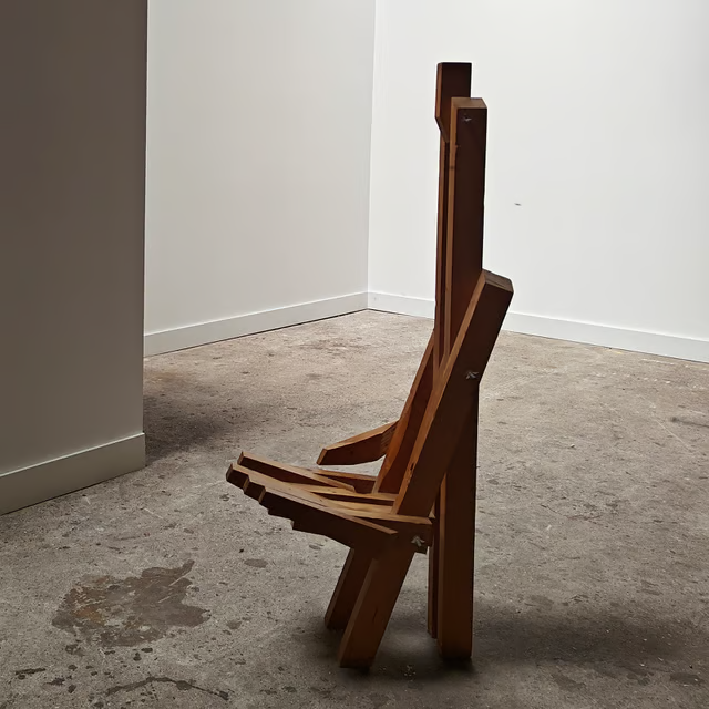 Sculptural hand shaped slatted chair 13.png