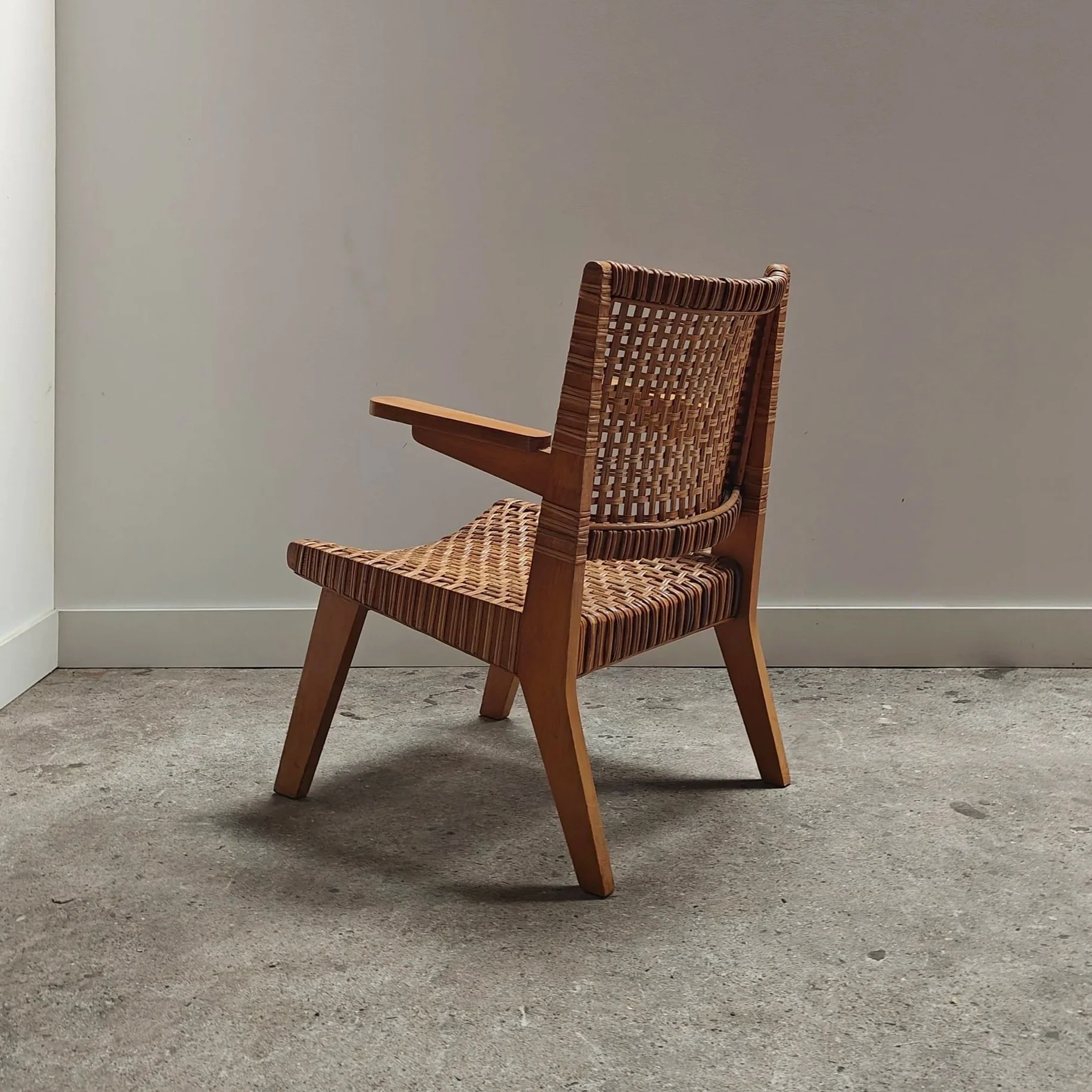 Rohe Noordwolde rattan and beech armchair