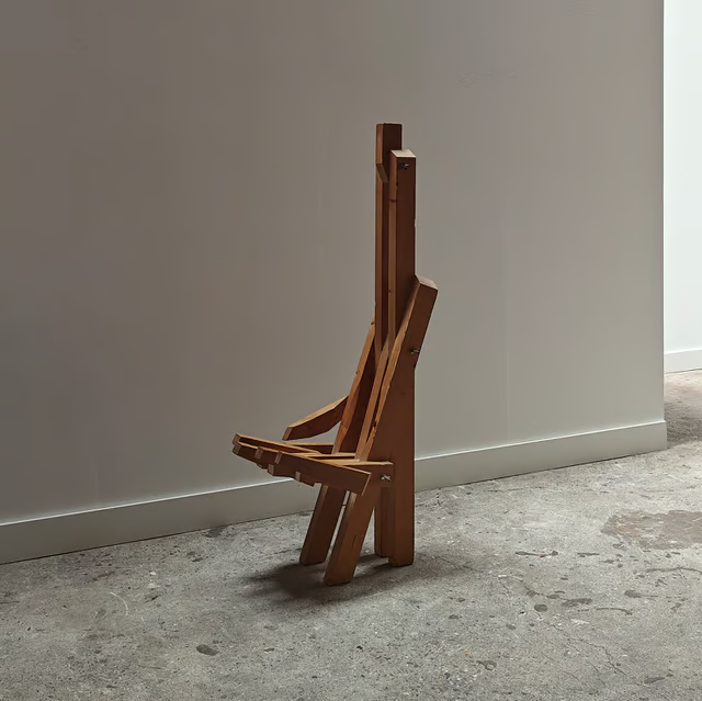 Sculptural hand shaped slatted chair 11.png