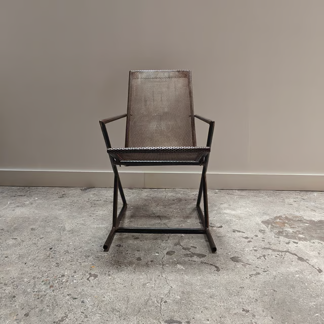 Studio made perforated zigzag armchair 6.png