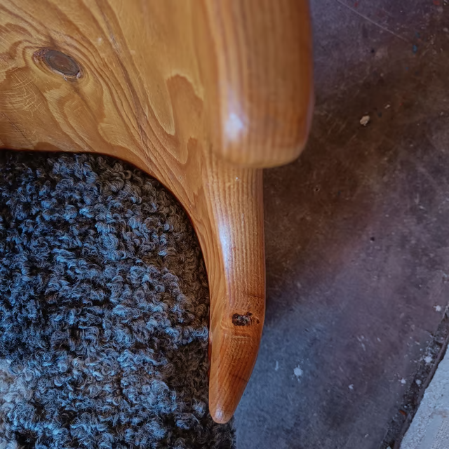 Tree trunk kubb chair with upholstered seat 7.png