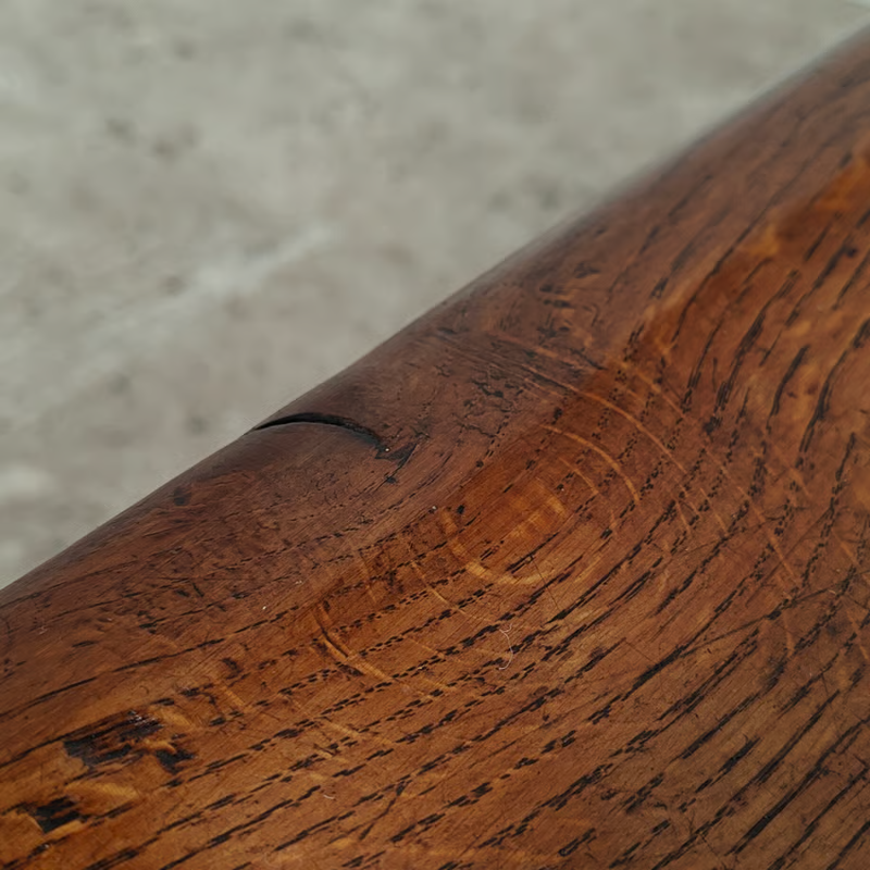 Antique oak bench in a subtle Amsterdam school style 4.png