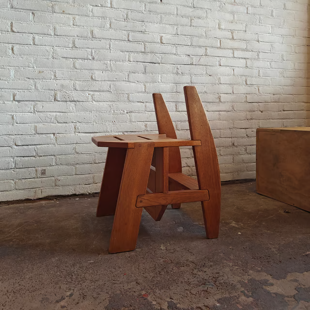 Versatile and sculptural oak stool 7.png