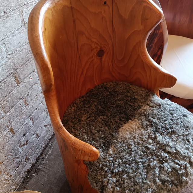 Tree trunk kubb chair with upholstered seat 2.png