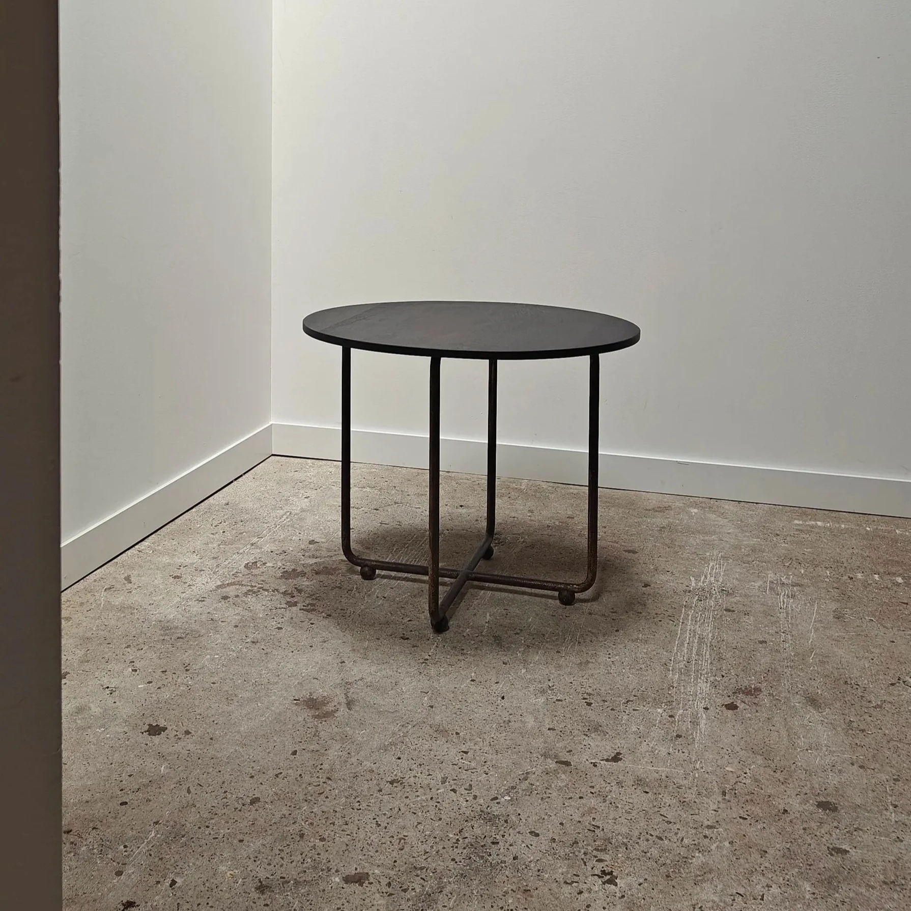 Tubular+sidetable+with+ball+feet+and+black+oak+top+2.jpg