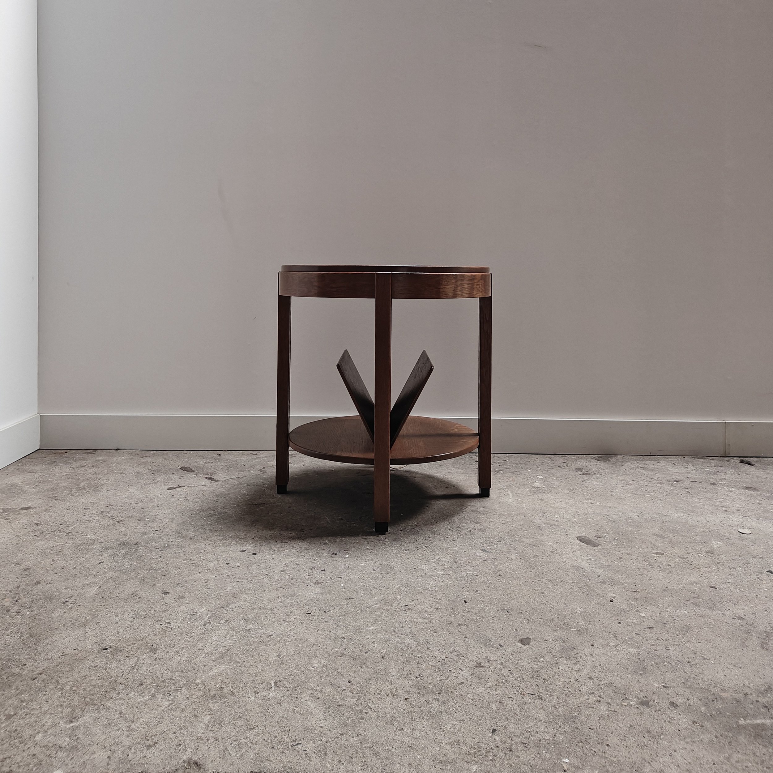 Round AmsterdamSchool sidetable with magazine rack 1.jpg