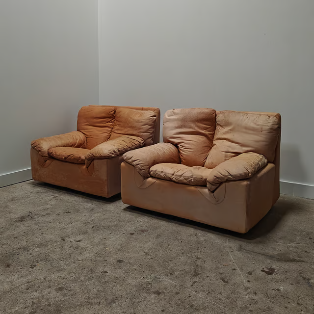 Patinated Italian leather lounge chairs