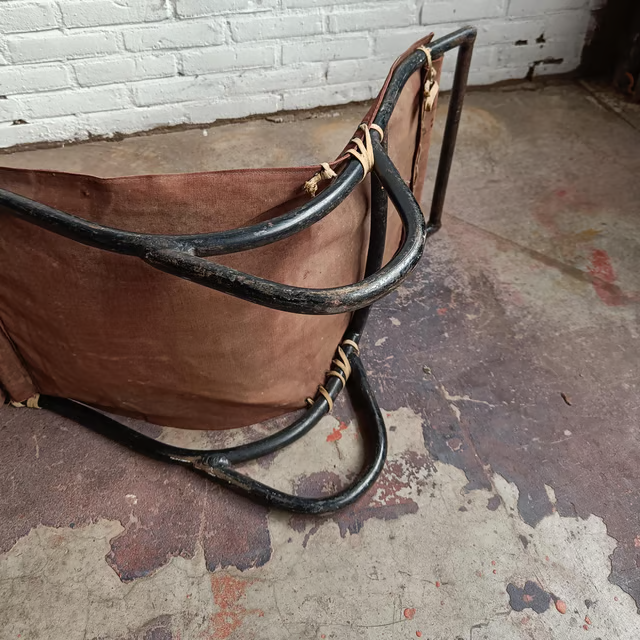 Low tubular and canvas lounge chair 6.png