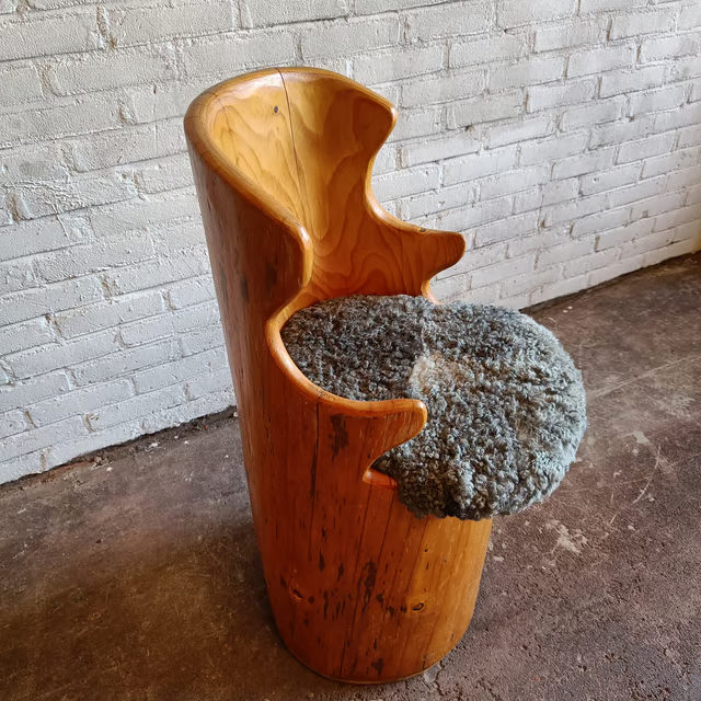 Tree trunk kubb chair with upholstered seat 5.png
