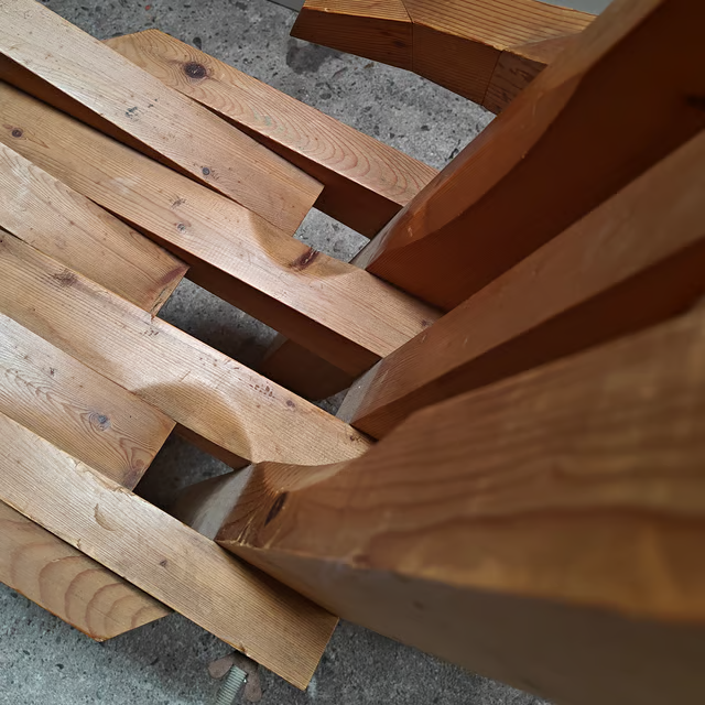 Sculptural hand shaped slatted chair 10.png