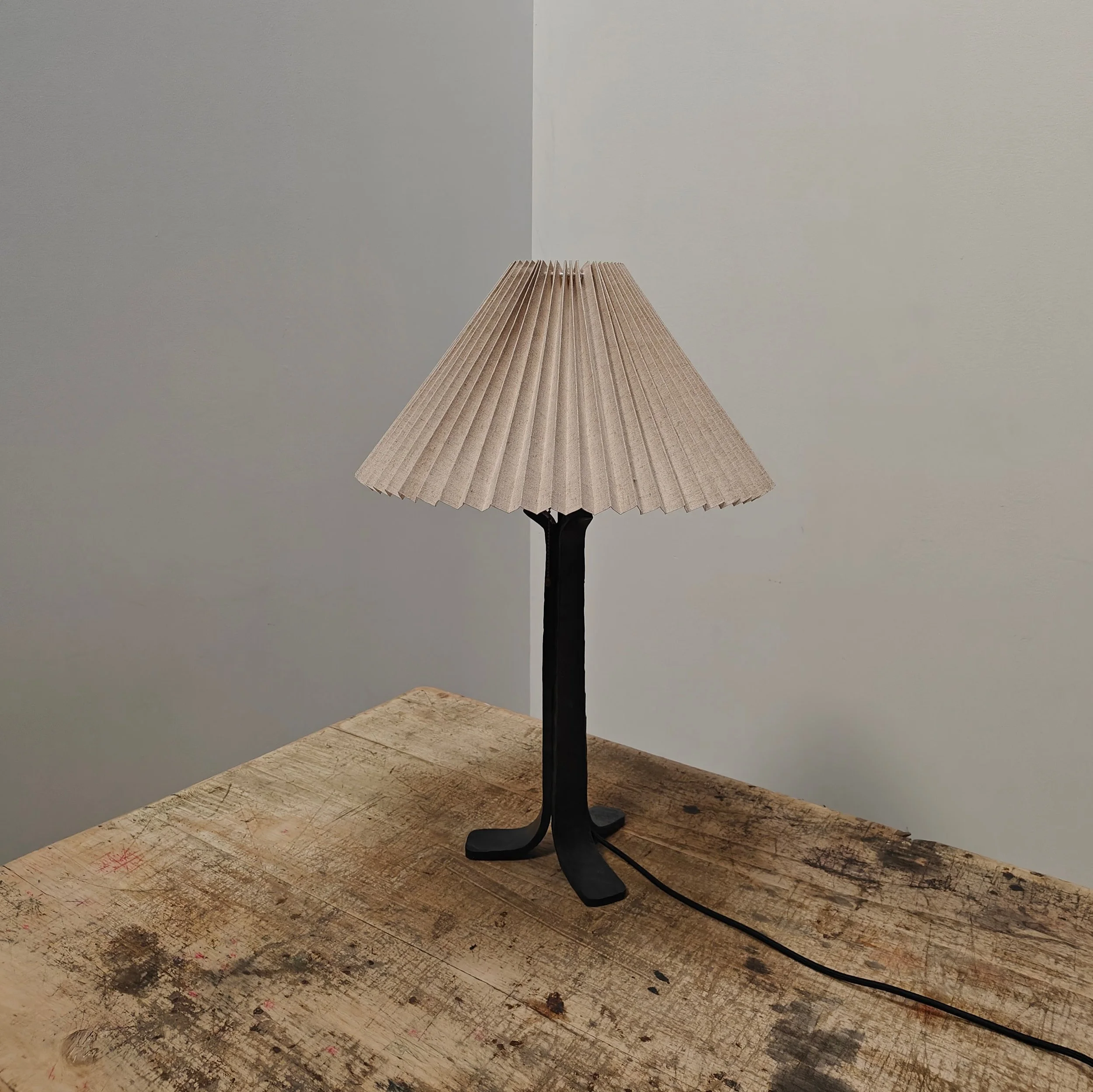 Wrought iron desk lamp with pleated shade