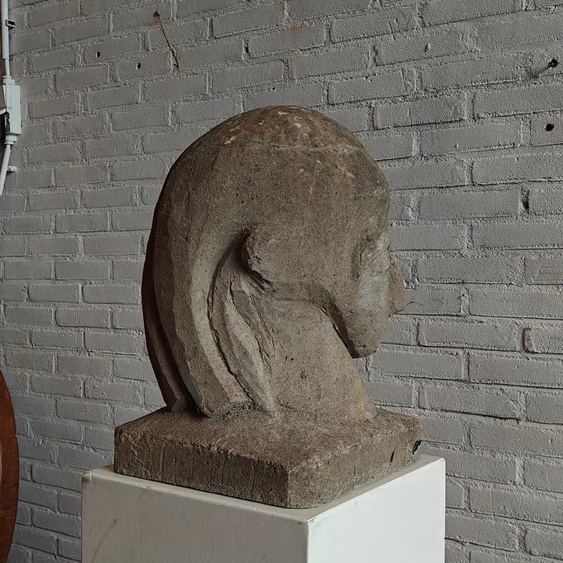 Concrete sculpture, stylized head 6.png