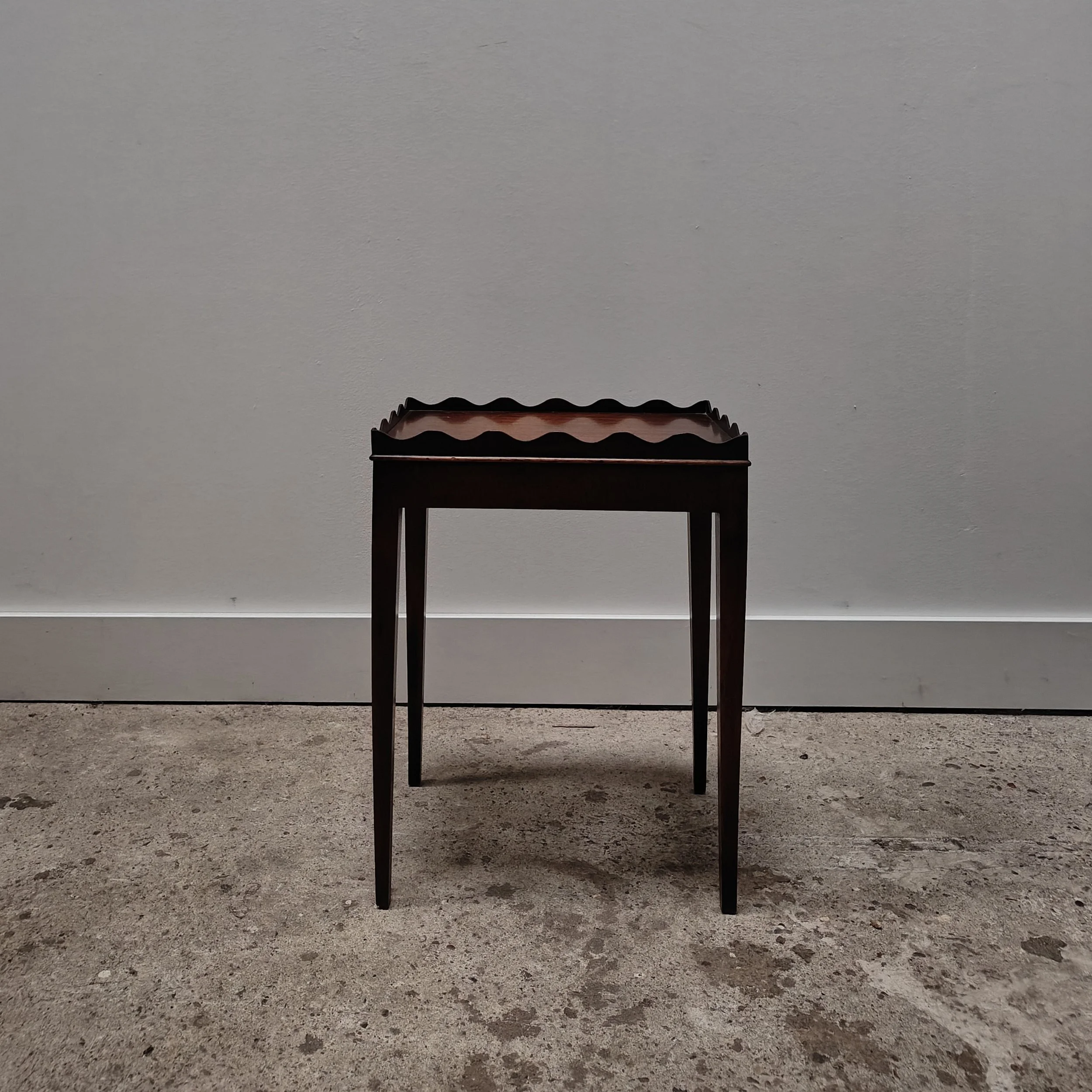 English side table with a wavy edge