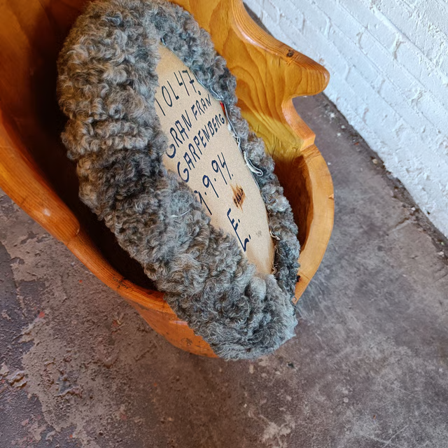 Tree trunk kubb chair with upholstered seat 6.png