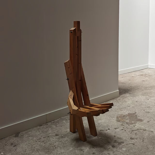 Sculptural hand shaped slatted chair 6.png