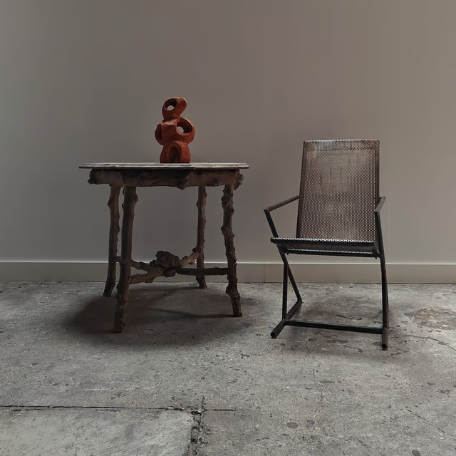 Studio made perforated zigzag armchair 7.png