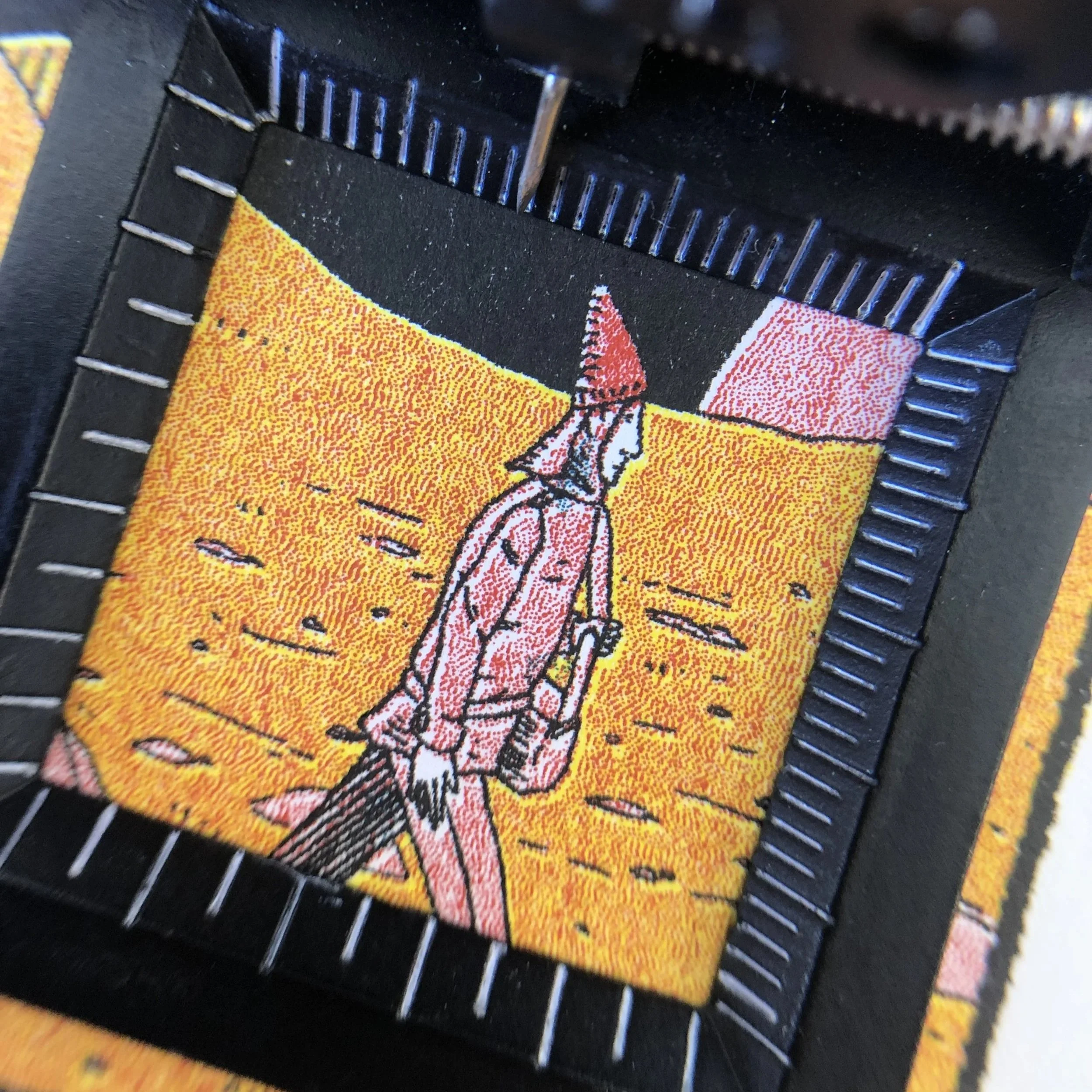RISO print close up through a magnifier.