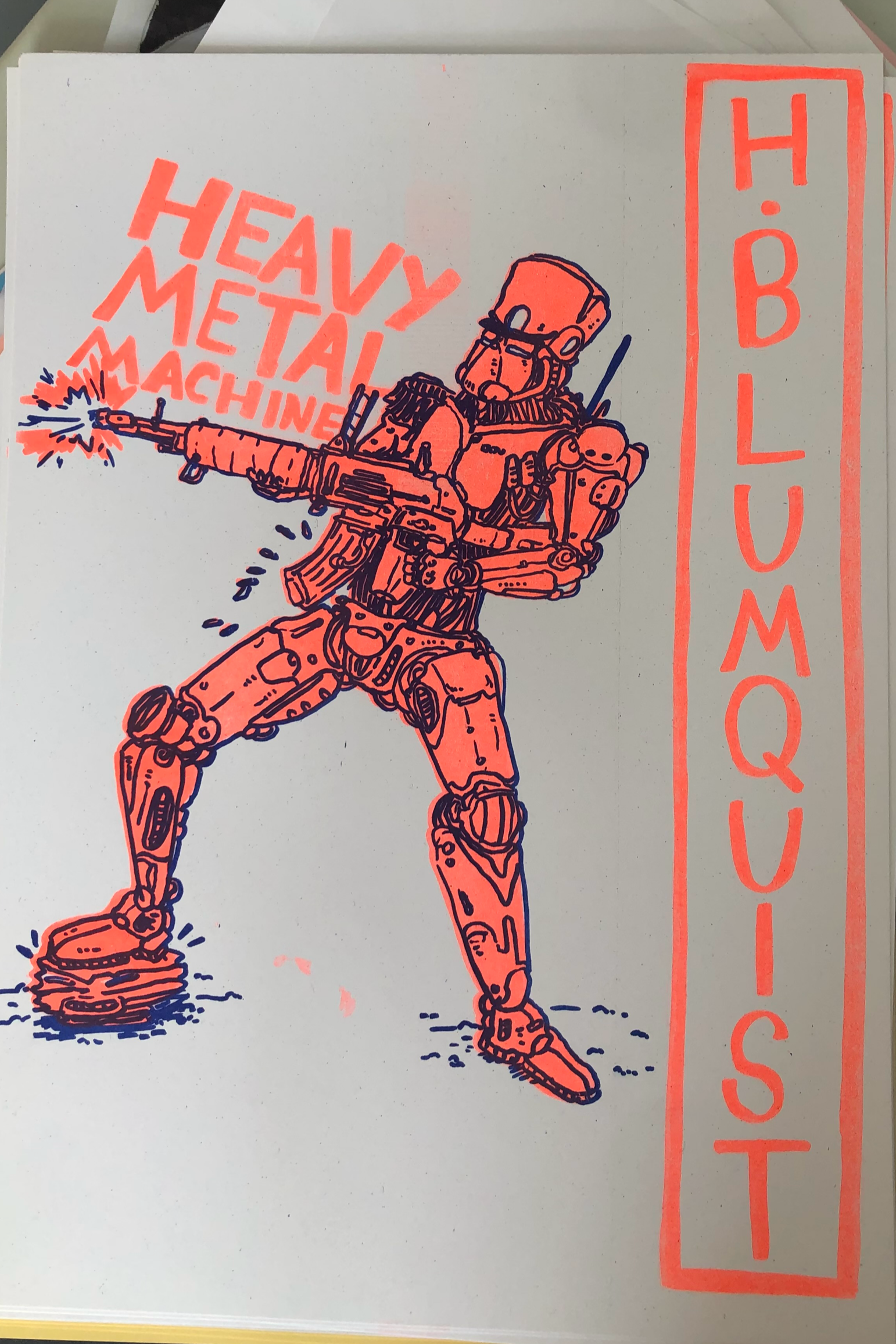 A drawing of a humanoid robot holding a firing weapon, with sparks at the muzzle, standing on a rock with a water puddle nearby. Red text on the right reads 'H. BLUMQUIST'. There is also text in the background that says 'HEAVY METAL MACHINES' in red.
