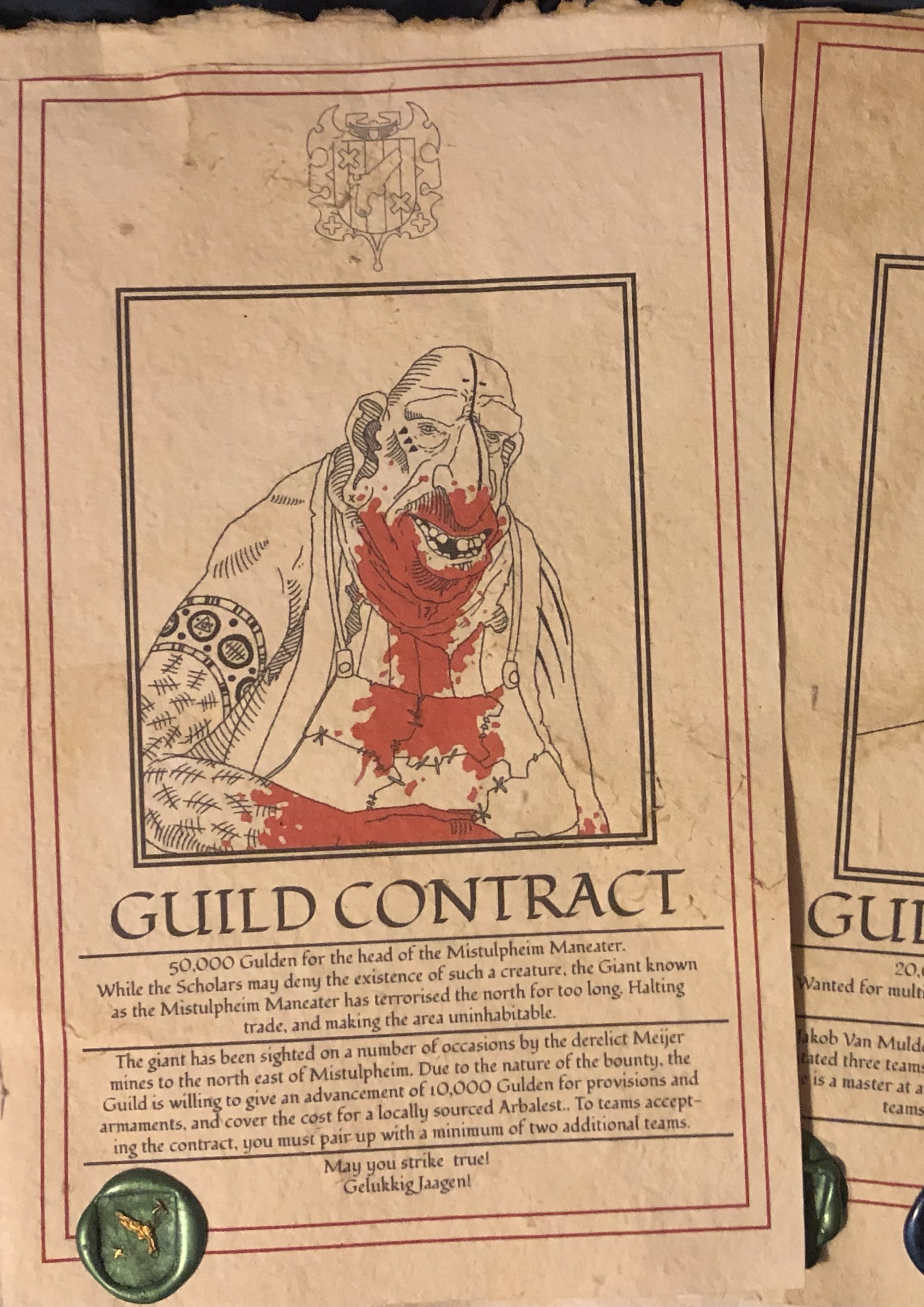 A paper document titled "Guild Contract" features a line drawing of a monstrous creature with red markings, an evil grin, and a tattooed arm holding a weapon, accompanied by some decorative seals or tokens at the bottom. The document appears old and worn.