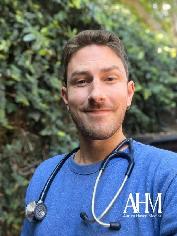 Dr. John Fernandez, headshot, AHM gender-affirming provider