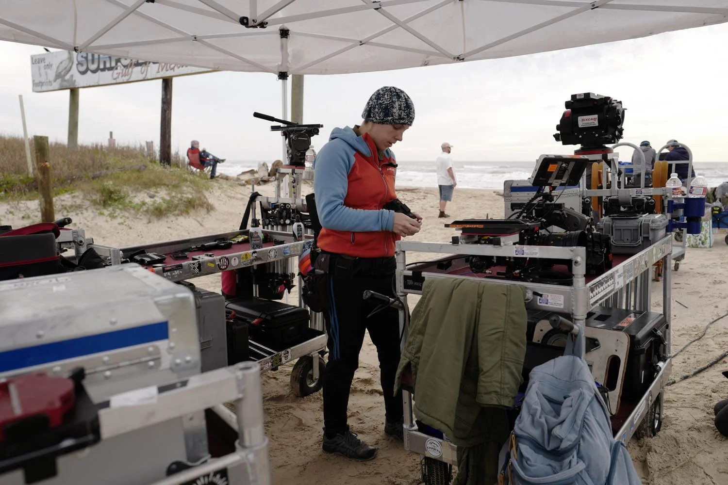 Kerianne Parker keeping the camera carts organized.