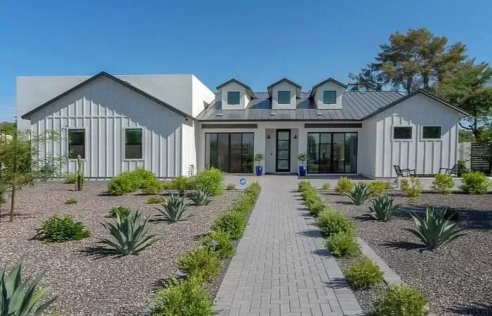 Modern custom home in Phoenix featuring 4,238 square feet, 5 bedrooms and 5 bathrooms, completed as a full design-build.