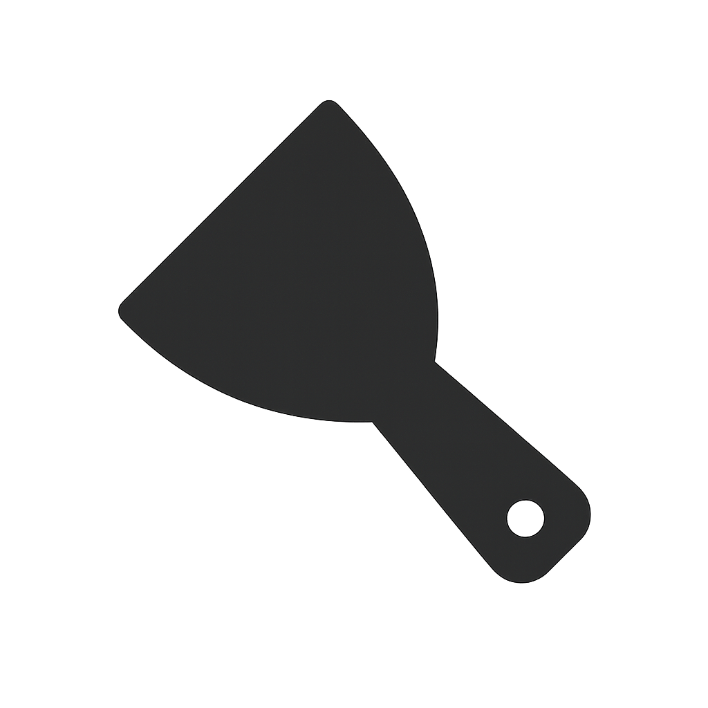 Black spatula with a rounded rectangular head and a hole in the handle.