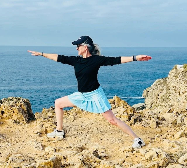 Mary striking a yoga pose