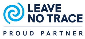 Leave No Trace logo with a blue swirl icon, black text, and the tagline 'Proud Partner'