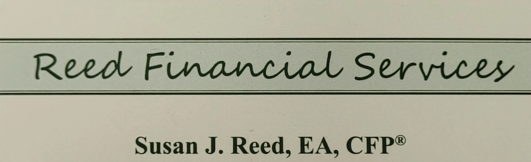 Close-up of a professional nameplate reading "Reed Financial Services" and "Susan J. Reed, EA, CFP" in black text on a white background.
