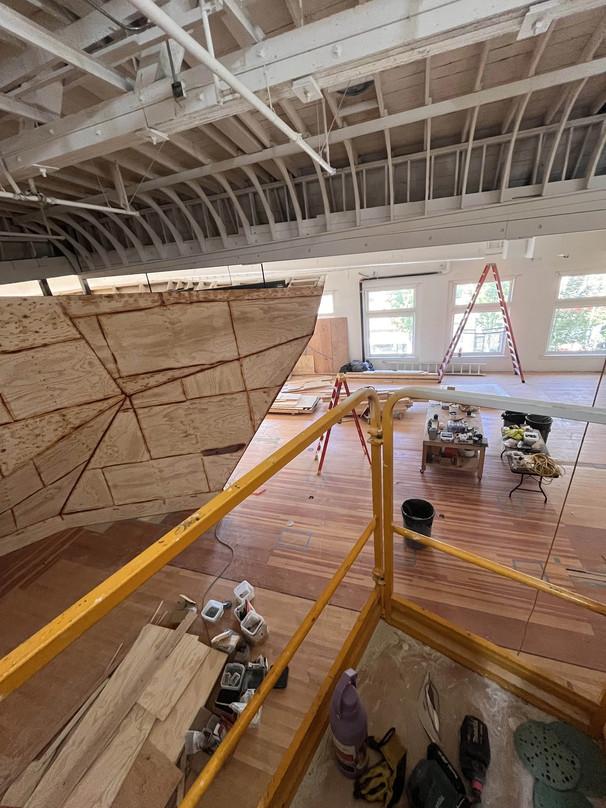 Working on scaffolding, partway through the epoxy process