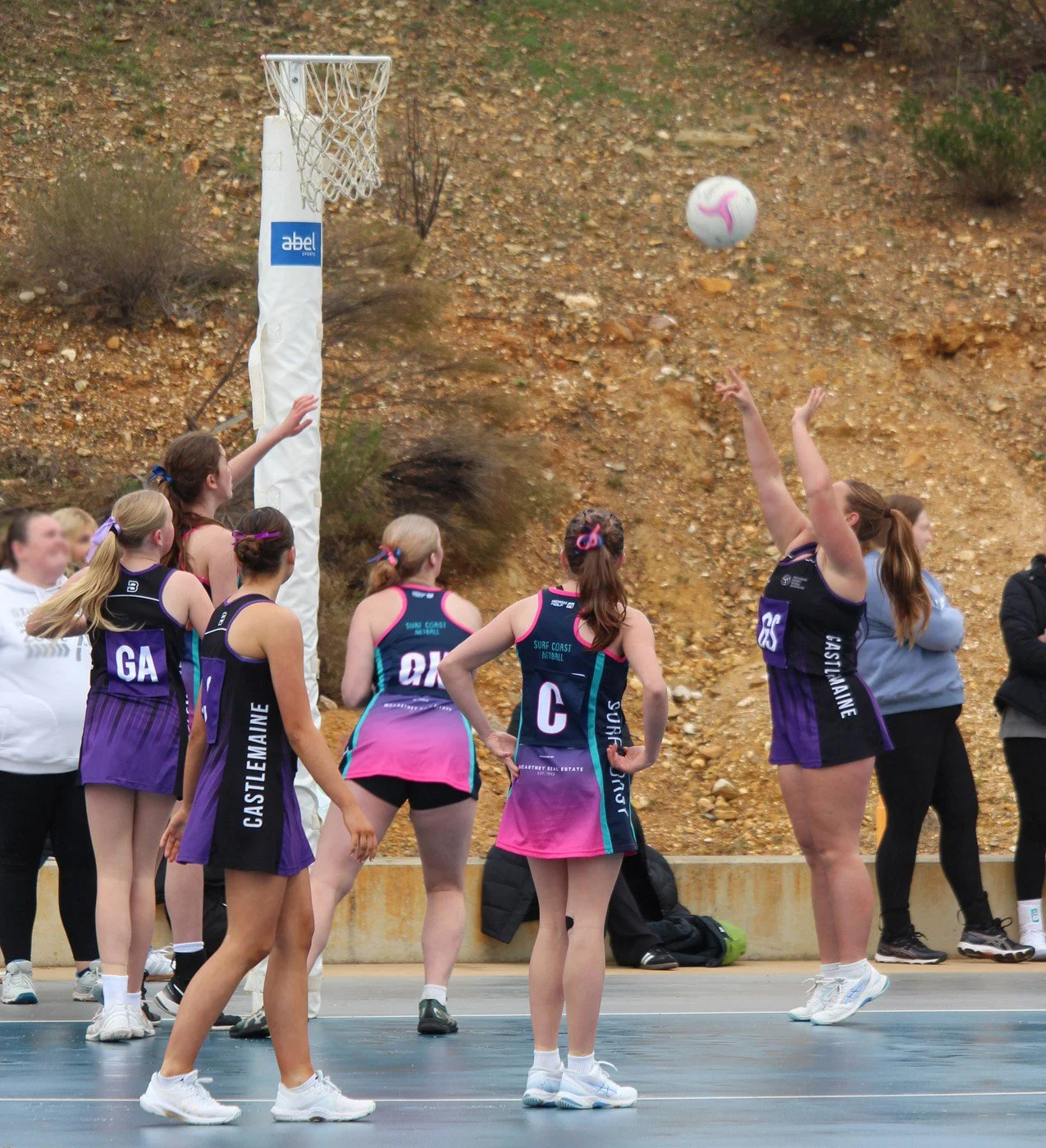 Squad team playing and shooting a goal