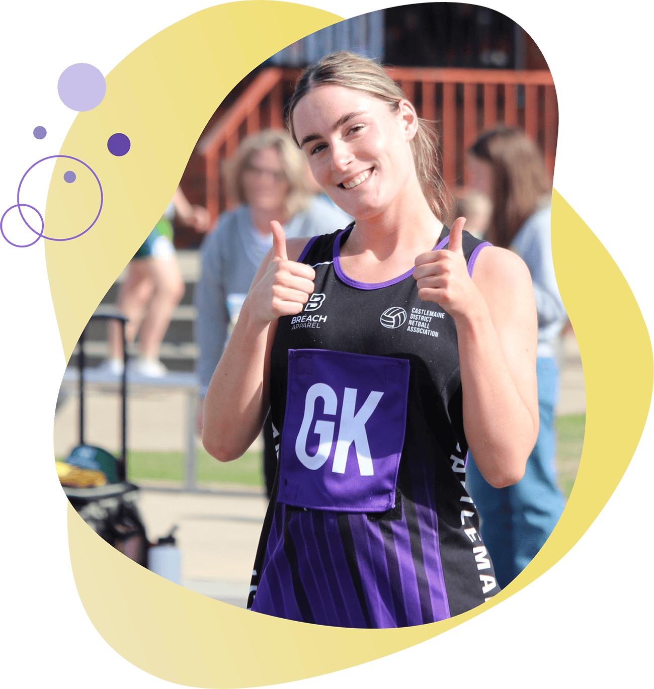 Netballer smiling with thumbs up