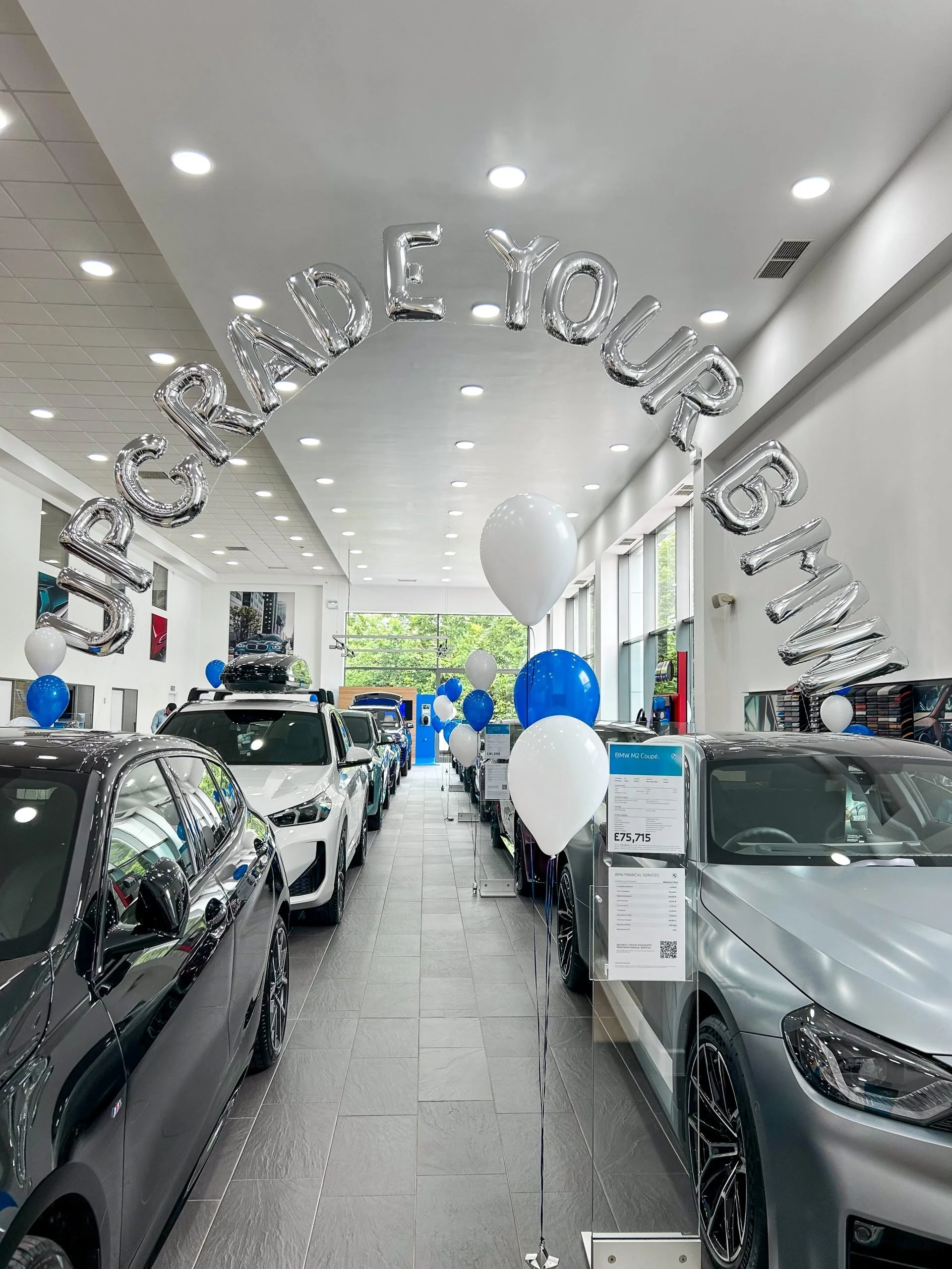 BMW Sales Event with Blue and White Balloon Arches