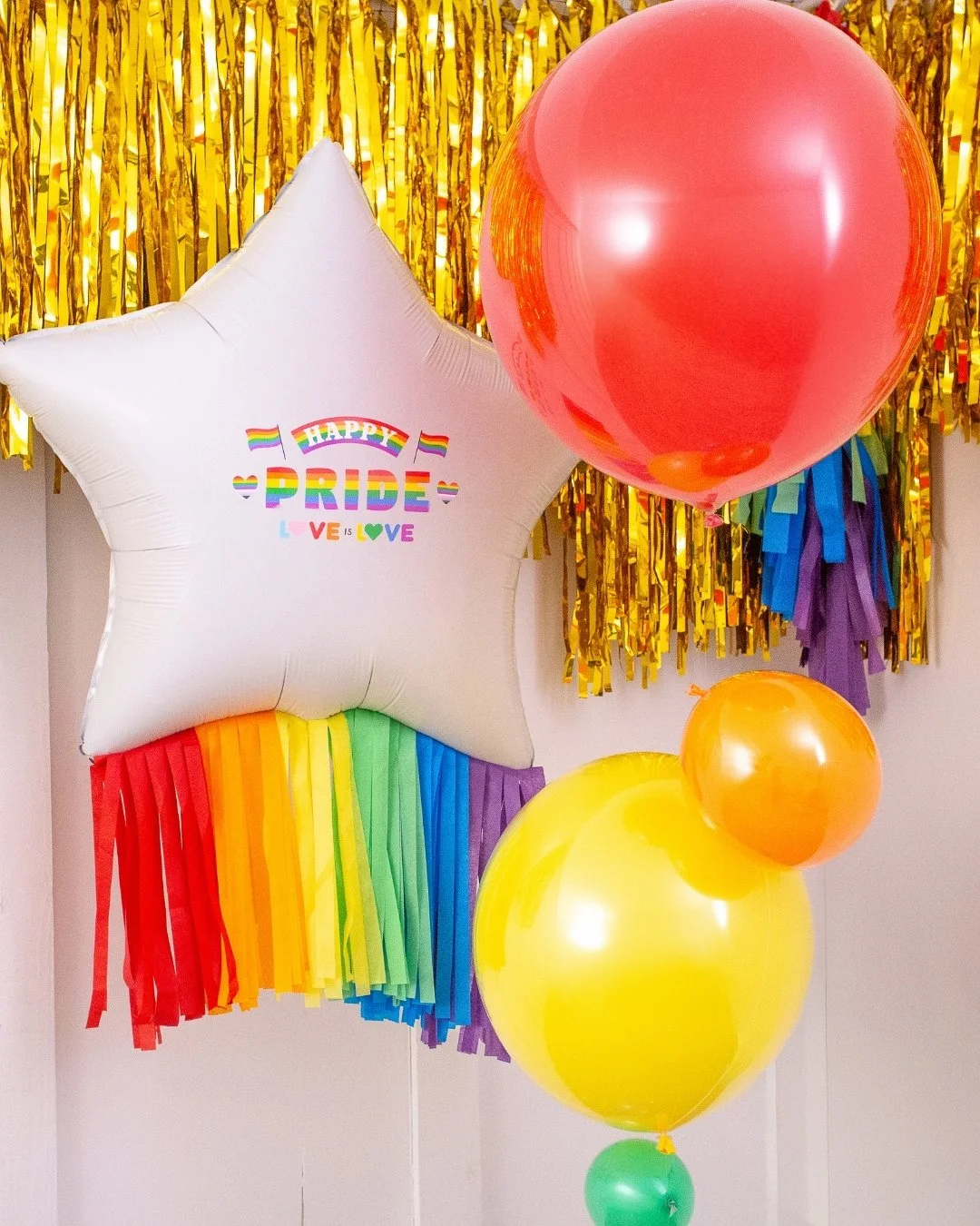 Pride Party Decor Inspiration: Balloon Pillars, Bubbles &amp; Rainbow Displays