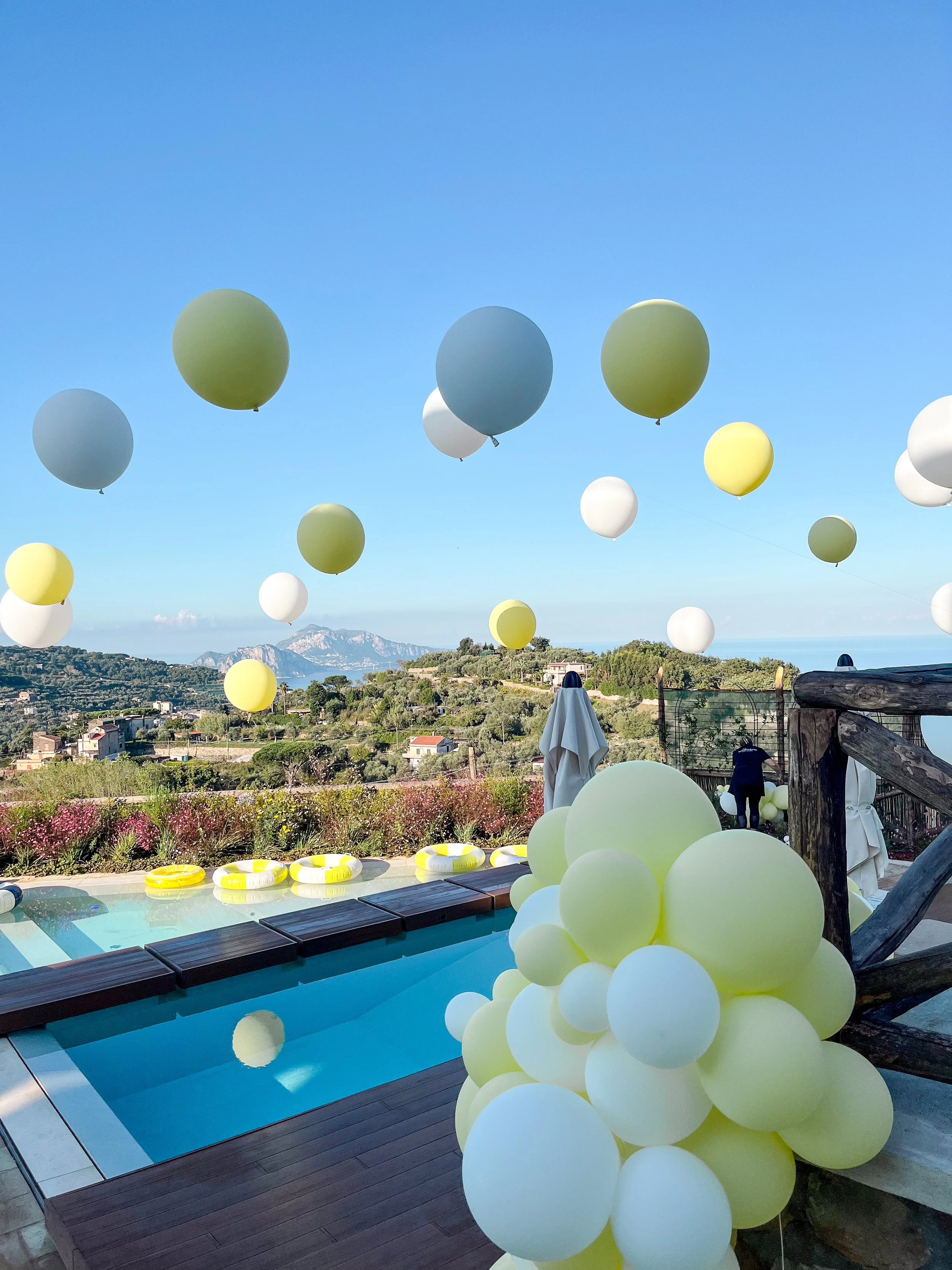 Italy Wedding After Party - Lemon yellow pool suspended