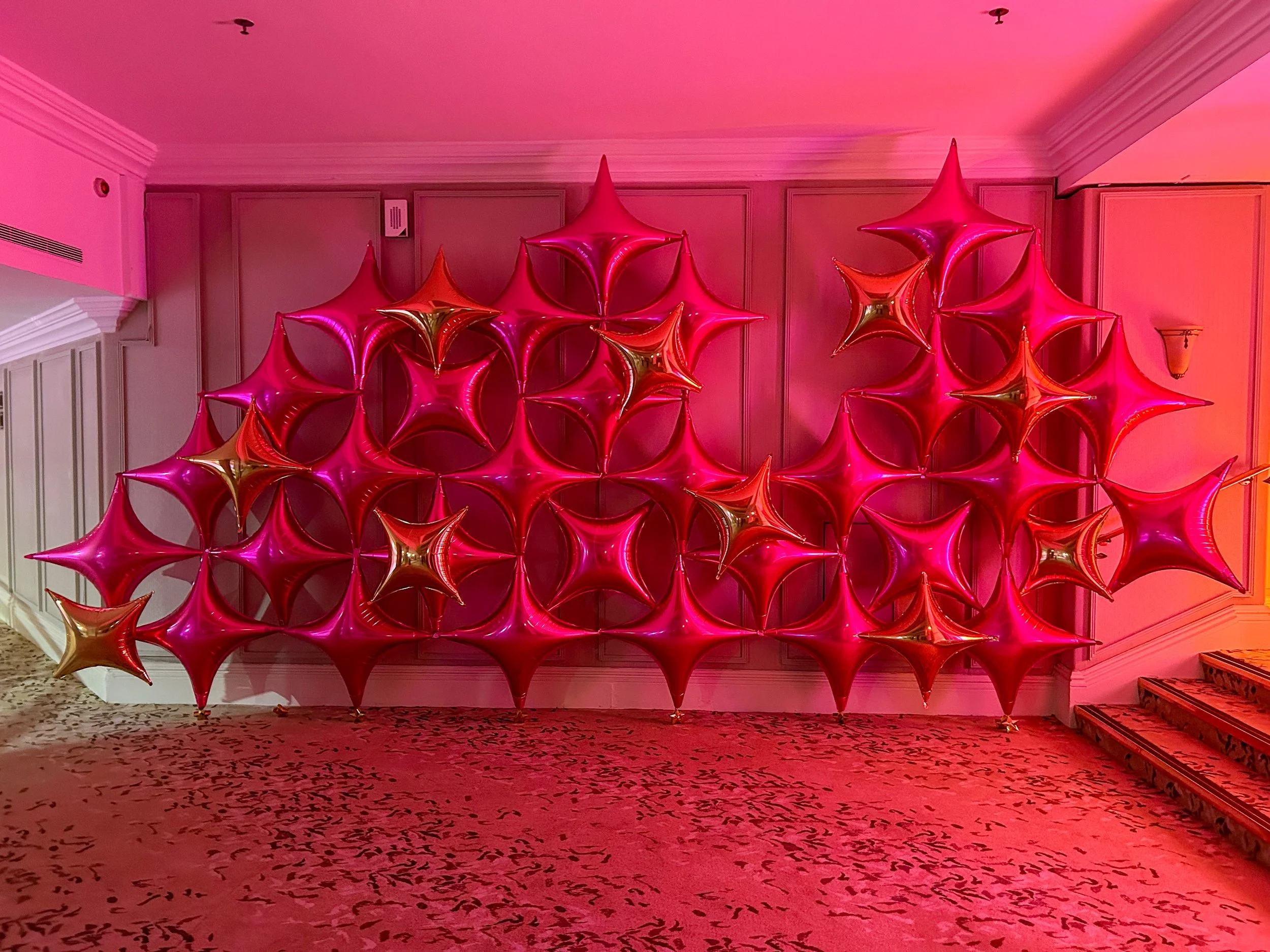 Performance Marketing Awards Grosvenor House Hot Pink Star Point Foil Installation Wall