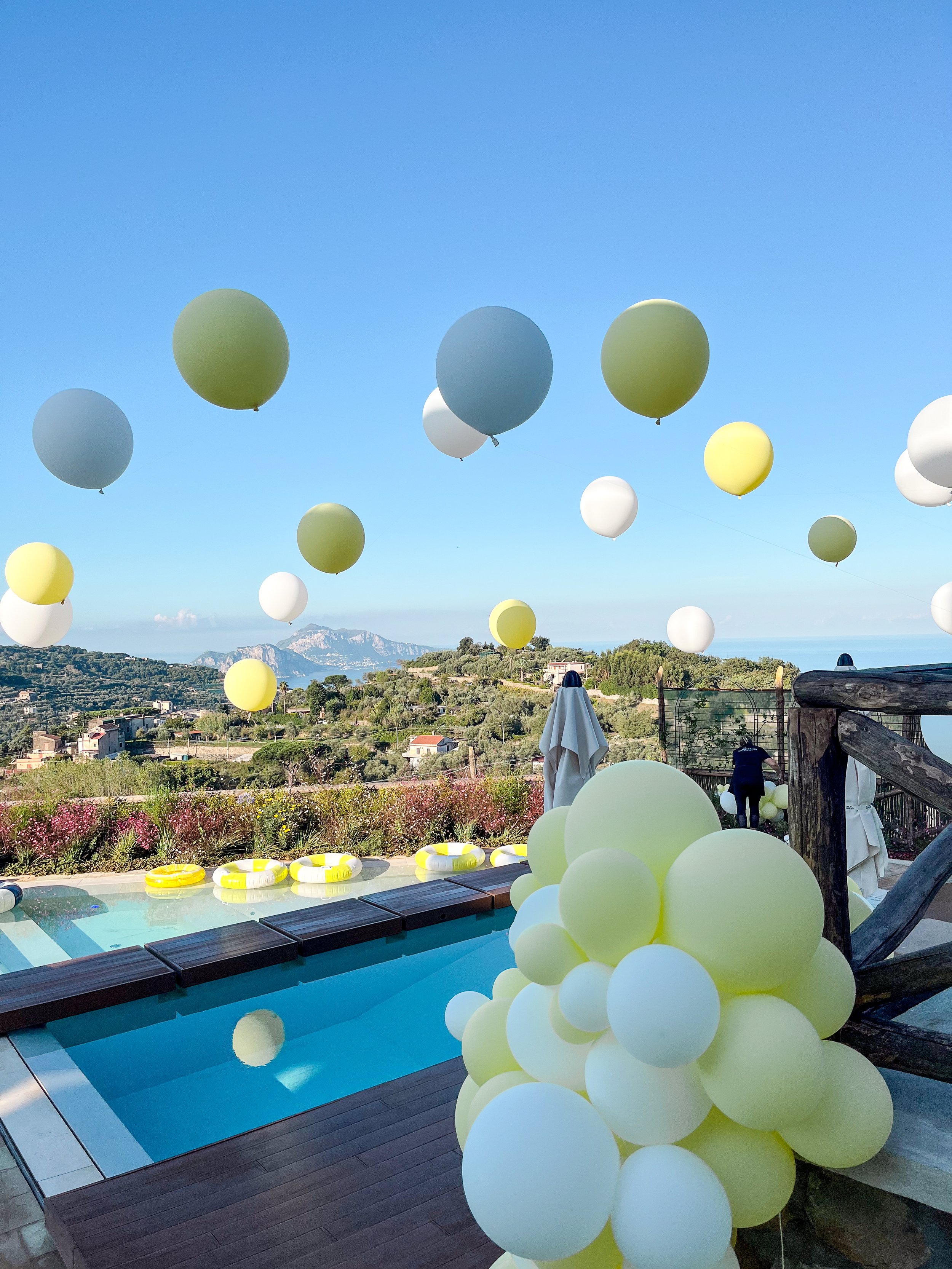 Italy Wedding After Party - Lemon yellow pool suspended